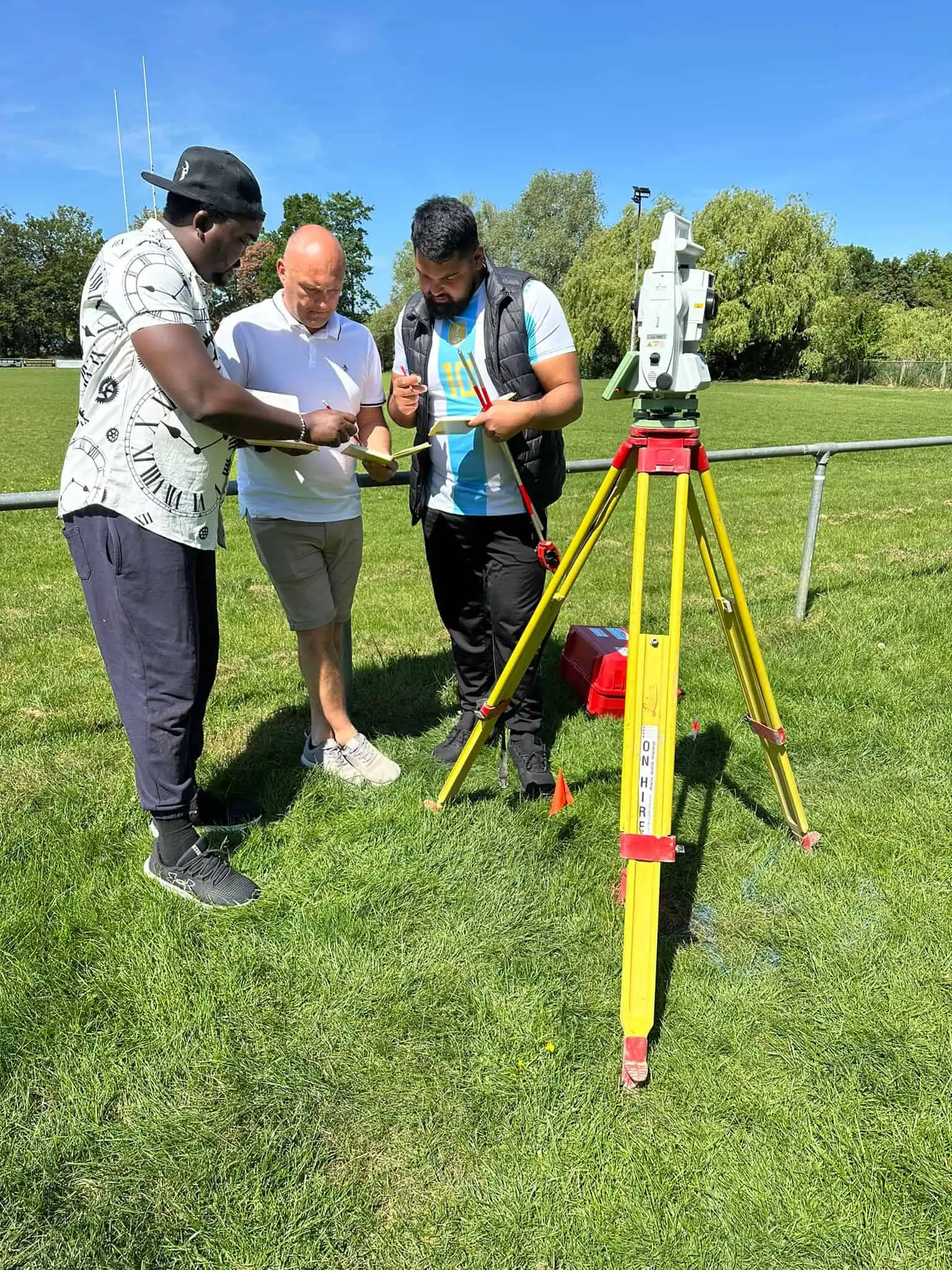 Instructor teaching students during a robotic total station site engineer course.