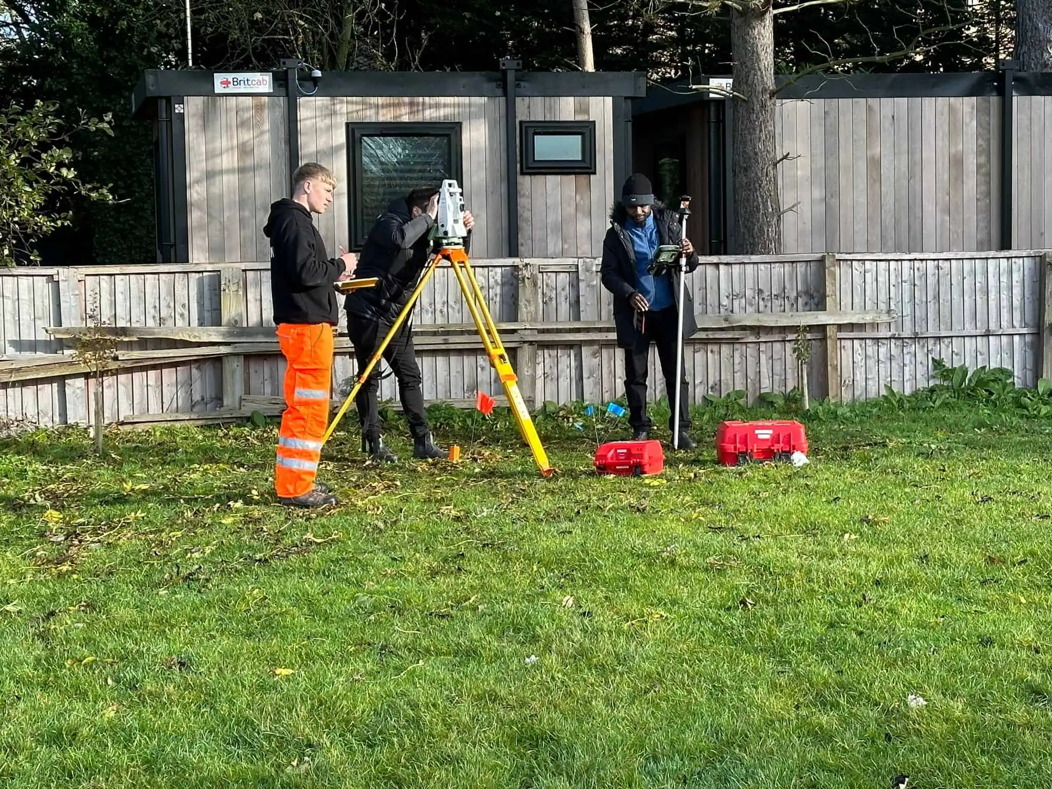 Students using a total station during practical construction setting out training.